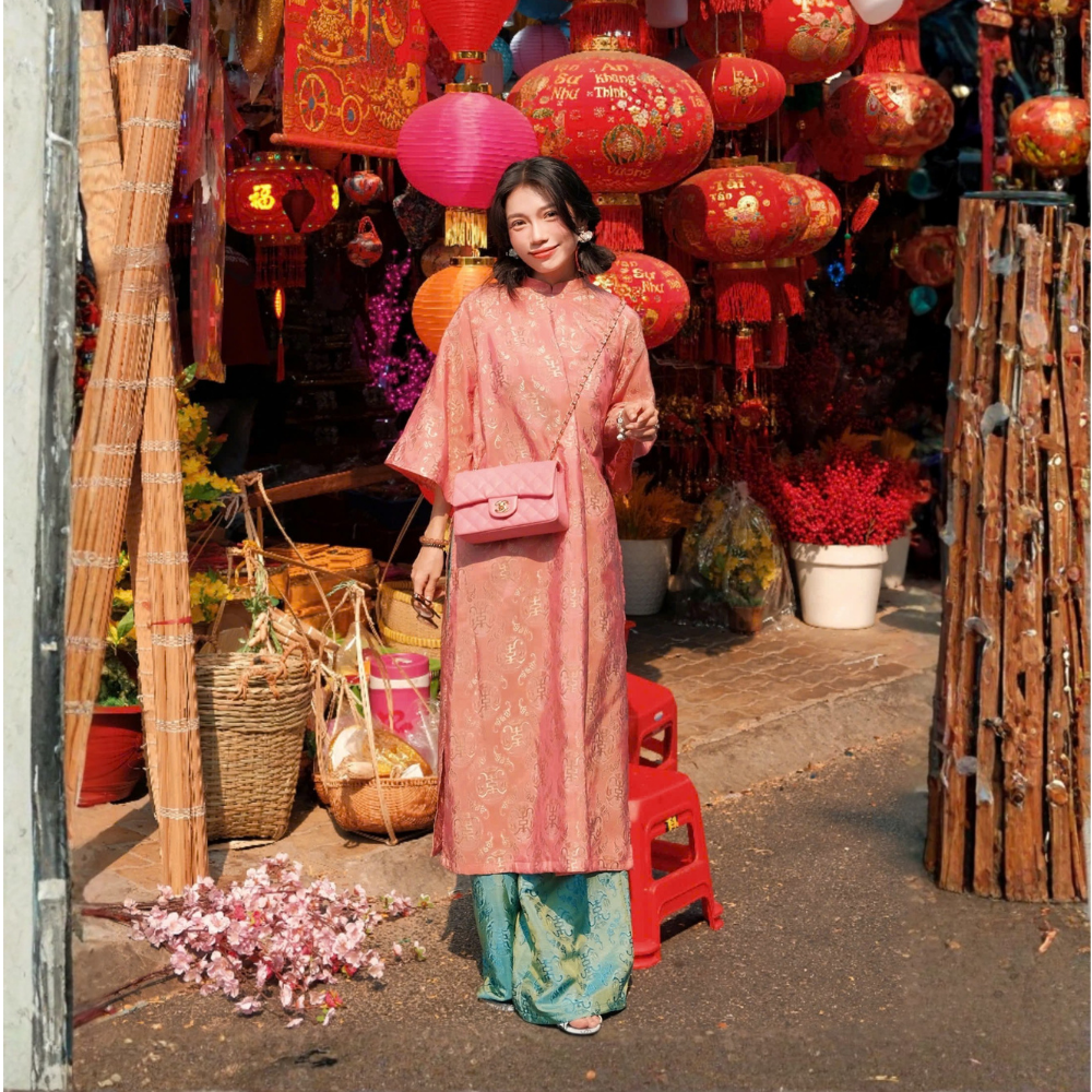 Áo dài tơ tằm hoạ tiết thọ dơi màu hồng cam - dáng cách tân